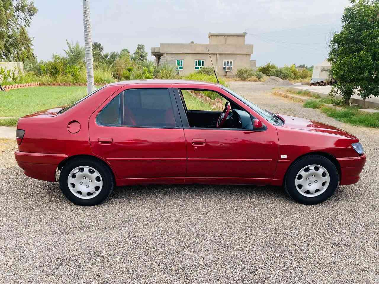 بيجو ٣٠٦ • ٢٠٠٢ • العلم