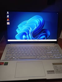 رايزن 9 7940HS • RTX 4050 6G • OLED 15.6 120Hz