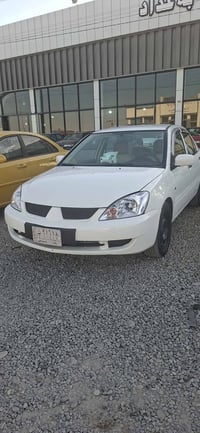لانسر • ٢٠١١ • اوتوماتيك