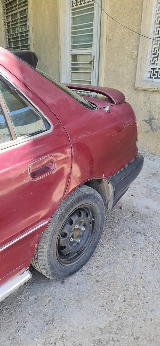 النترا موديل ١٩٩٤ رقم دولي بأسمي 
محرك مفتوح قبق اسود كير اوتوماتك سيارة جاهزة من كل شي تخم تاير باتري جديد ترايك وين مايعجبك صدرهة ٦٠% فرممات بلاد بدون اي لحيم شواصي مكفولة . مكاني الدورة ابو دشير هاتف *********** .
