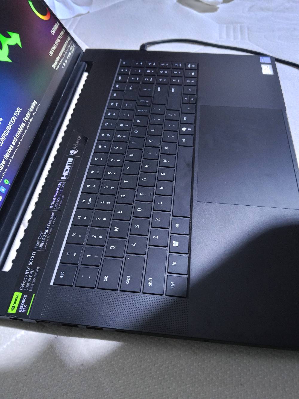 Razer Blade 18 2025 (RTX 5070 Ti) Dual 4K UHD+240Hz | FHD+440Hz Gaming Laptop
(🍀 للبيع فقط🍀) 
سعره ببعض الدول حاليا كجديد
Its price as new in some countries:
3,500$ in USA
3,600£ in UK
3,700€ in Europe 
5,000$ in Singapore
20,00 SAR in Saudi Arabia
لابتوب كيمنك اشبه ب PC متنقل. 
بهيكل من الألمنيوم.. وبشاشة مضادة للانعكاسات. 
يشغل أقوى الألعاب بأعلى إعدادات وفريمات ويشغل افلام 4k
قابل لزيادة RAM الى 96GB و Storage الى 8Tera
يمكنك إضافة RTX خارجي ايضا.
صوته عالي فيه 6 سماعات. 
It's loud.. it has 6 speakers.

Gaming Laptop: Razer Blade 18 2025 Dual 4k UHD+ 240 Hz  FHD+ 440 Hz 
Graphics: NVIDIA GeForce RTX 5070 Ti (12 GB GDDR7 VRAM)
Processor: Intel CoreTM Ultra 9 275HX
Storage: 1 TB SSD Memory: 32 GB
Screen Size: 18 inch   16:10
400 Watt
Thunderbolt 5
You can add RTX External too
Other Features.................... 
No damage, clean 100% 
Used like new

سأعطيك معه مجانا:
I will give you with it:
إضاءة تفاعلية تتغير مع ما هو معروض على الشاشة. 
Backlight that reacts to what is displayed on the screen - Free

حقيبة ظهر تناسب حجمه
Backpack that fits its size - Free

 برنامج SVP 4 PRO لزيادة السلاسة و عدد الفريمات اثناء مشاهدة الافلام والمسلسلات. /حذف الأطارات السوداء من الافلام والمسلسلات والأنمي. 
SVP 4 PRO Program to increase Movies frame rates /And remove black bars from Anime, Movies and T Series
السعر شكد نهائي؟ وهل أكو مجال بسيط للمساومة لو ثابت؟: 
بيه مجال للشراي