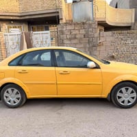 اوبترا موديل 2011 السياره للبيع المنطقه بغداد المعامل الباويه رقم الجه...