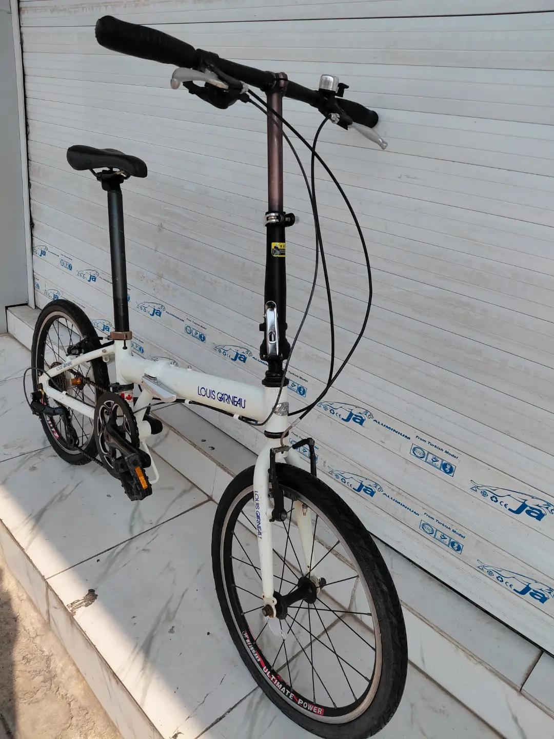 LOUIS GARNEAU FOLDING BIKE حجم 20 المنيوم بالكامل    ✈يوجد توصيل لجميع المحافضات ✈ كركوك مدخل سايدين حي الاسرى والمفقودين  معرض ابو شيفان ( *********** )
