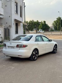 زوم 6 • ٢٠٠٦ • اوتماتيك