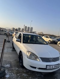 لانسر • أبيض • مرخّص ٢٠٣١