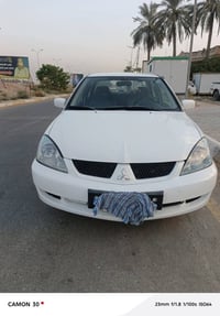 لانسر • ٢٠٠٩ • مكفولة عدا الدعاميه