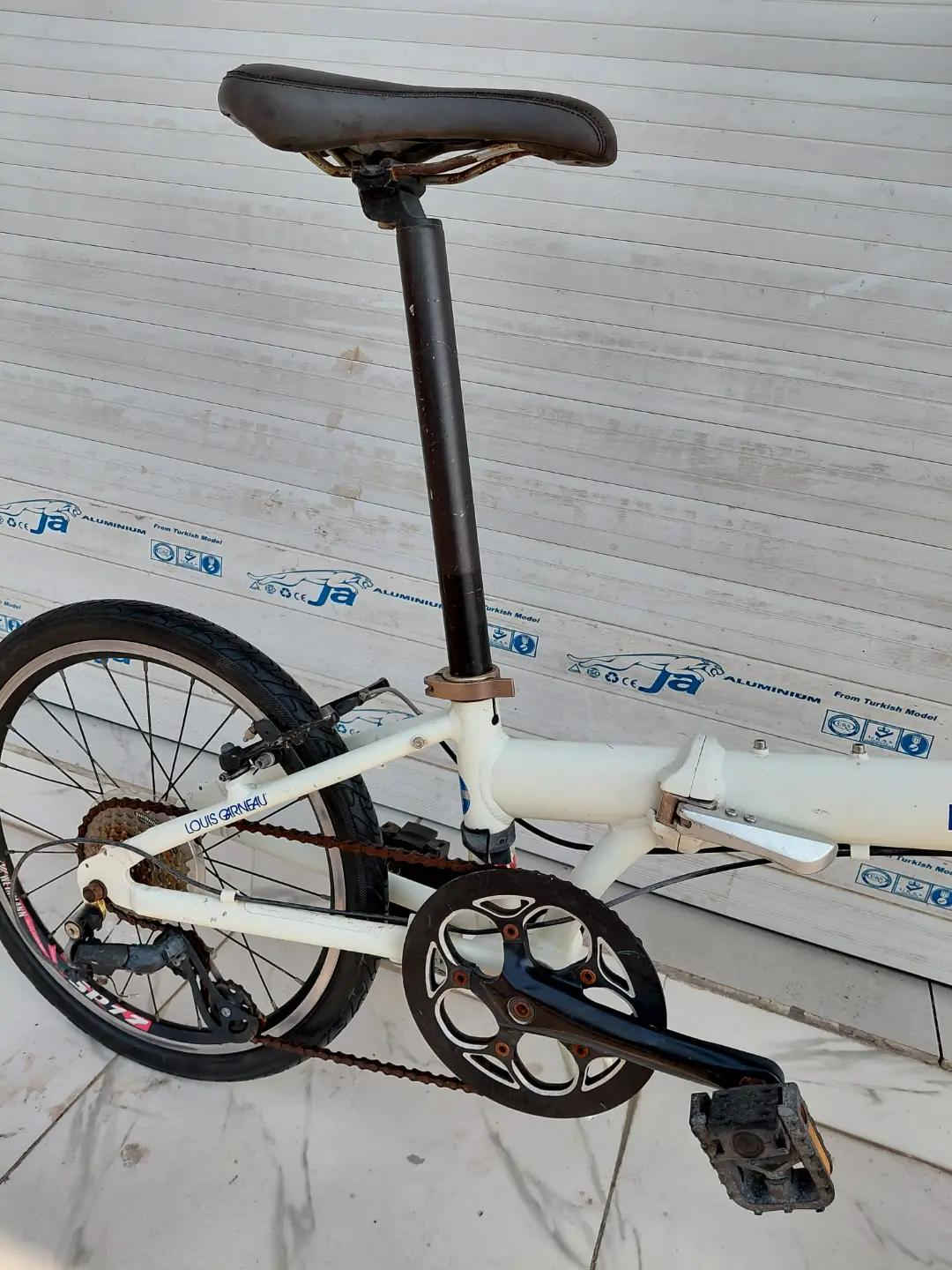 LOUIS GARNEAU FOLDING BIKE حجم 20 المنيوم بالكامل    ✈يوجد توصيل لجميع المحافضات ✈ كركوك مدخل سايدين حي الاسرى والمفقودين  معرض ابو شيفان ( *********** )
