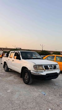 بيكم نيسان • ٢٠٠٣ • مزايدة كركوك