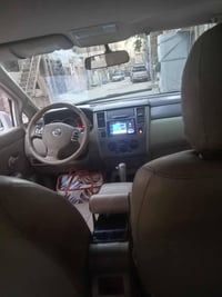 للبيع نيسان فيرسة 2007 امريكي اللون ابيض رقم بغداد انكليزي مكفولة من ا...