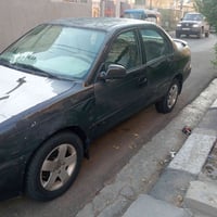كورولا • ١٩٩٧ • رقم بغداد