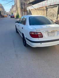سني ٢٠٠١ • مصبوغ • رقم بغداد