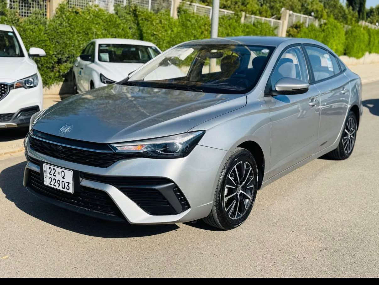 ﷽ 
‏MG 5 comfort 2025  
سەیارەکە شکڵ نوێ یە ئۆکتان 91 بەهیج جۆرێک دیلکۆ لێنایەت پێش و دوا لید لایت لایت زینۆن عەدەسە ویل کڕۆم دەسک بەسمە ئۆتۆ هۆڵد برێک کارەبایی تاعدیل سورعە سوکان ڤۆلیۆم تەبرید مەرکەزی دوو بەسمەی لەگەڵایە سەیارەکە لە سلێمانیە  بەناوی خۆمانەوەیە سەیارەکی زۆر جوان و نازدارە 
ژمارەی خاوەنی:*********** السليمانية, العراق
