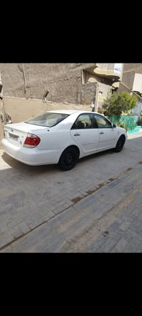 كامري ٢٠٠٣ • مكينة ٢٤٠٠ • رقم بغداد