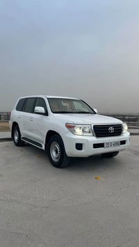 لاندكروزر GX2013 ماشية 150 الف محرك جديد زيروا قبل فترة انشدلها مكفولة...