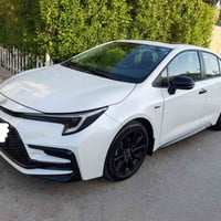 كورلا هايبرد 2025 اس بلاك ادشن ماشية 11الف رقم بغداد 07707120650