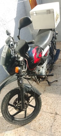 دراجه بوكسر مرقمه نظيفه وباسمي للبيع 07719655450