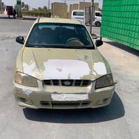 اكسنت فيرنا • ٢٠٠٢ • رقم بغداد