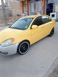 اكسنت تكسي رقم بغداد 2008 بسمي كير محرك شرط هيئه وغرامات صفر للأستفسار...