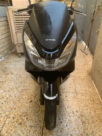 pcx جيل ثاني ياباني JF محرك 125  لون اسود دراجه جديده كلش وجاهزه من كل...