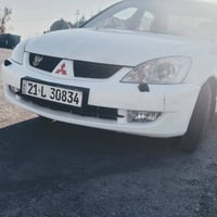 لانسر ٢٠٠٩ • بدون دواخل • كفالة سنوية