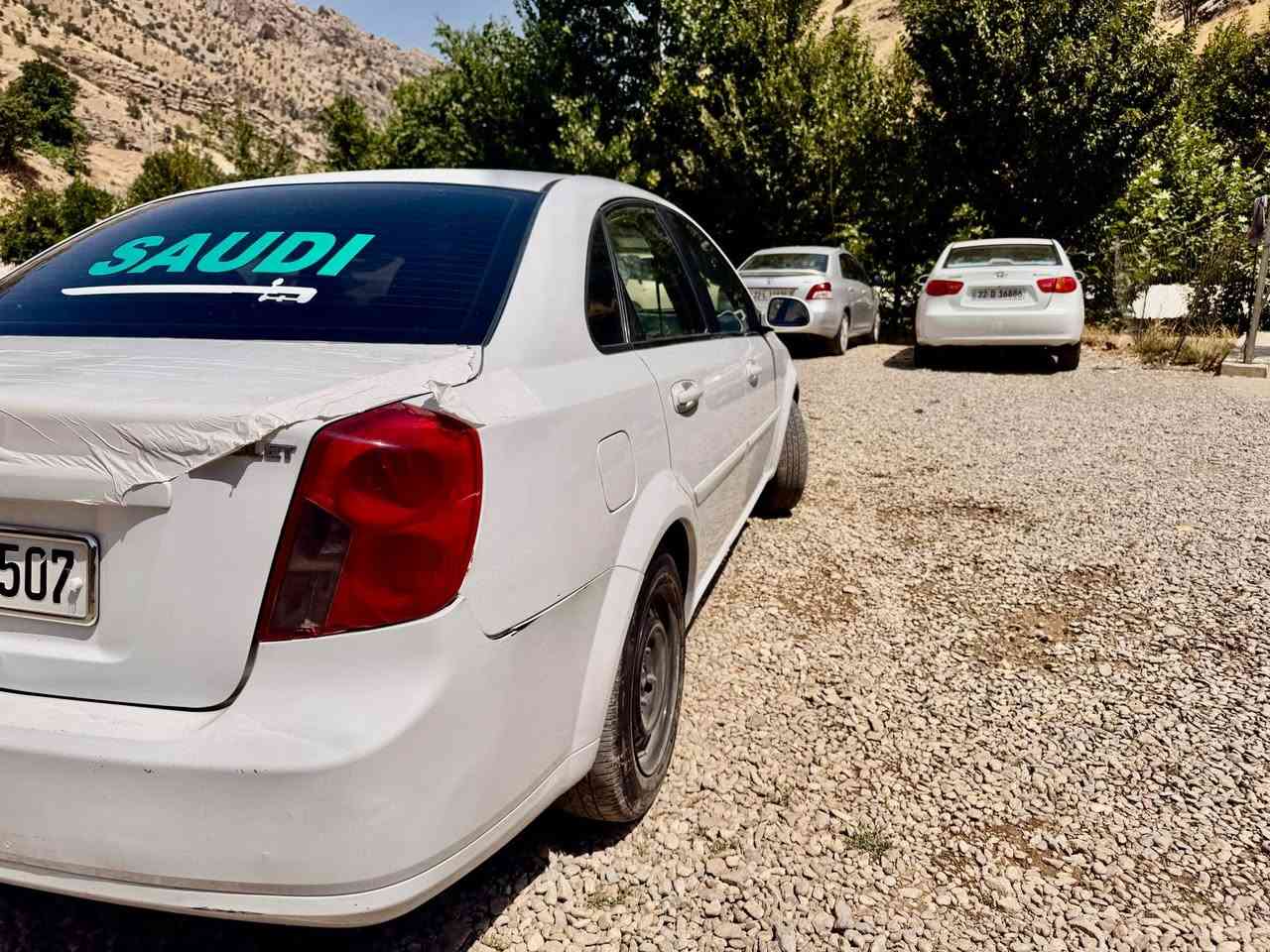 (﷽) 
سلاو هاوریان ئۆپتریەک ٢٠١١ گیر عادی بەس زۆر خاوینە 
هیچ سبوغیکی نیە تەنها جی لیوی بۆنیتی بستیکی سبوخە کە لە رسمەکەش دیارە قبو قۆپی مامناوەندە وە لەگەل سەرفیش دەکا 
سەیارەکە لەروی داخیلی زۆر جوانە وە لۆ سعری ٨٣ وەرقو مجالیکی براینەشی تیدایە وە گۆرینەوەش دەکەم  وە غرامی 780$ لە پاش معمەلی وەردگریوە لەگەل ریزم لۆ هەمو هاوریان (***********) أربيل, العراق
