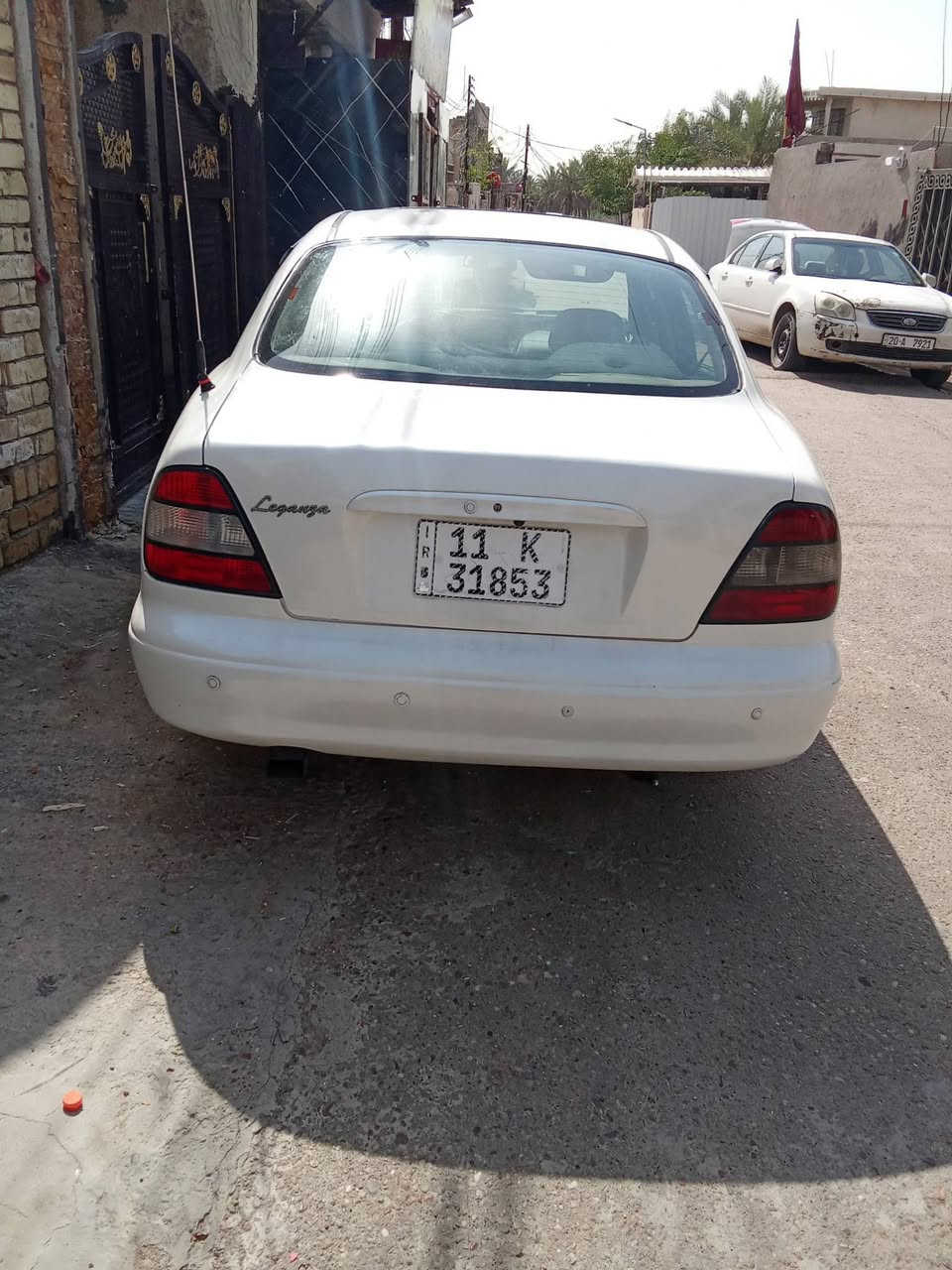 لكنزا 2000 كير محرك تبريد مكفول
*********** الشراي يتصل مكان بغداد الشعب 
محرك اوتوماتيك 
تخم تايرات 
صدر جديد 
سنتر لوك شاشه لمس 
رقم الجديد بغداد 
سيارة نضيفه
