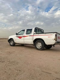 نيسان مزايده • ٢٠٠٣ • مكينة تعبانه