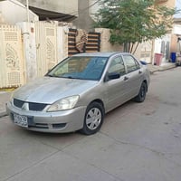 لانسر ٢٠٠٩ • اوتوماتيك • اربيل