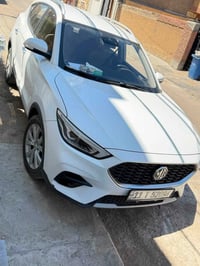 MG ZS موديل 2021 - لون ابيض رقم بغداد  ماشية 70 الف *المواصفات:* المحر...
