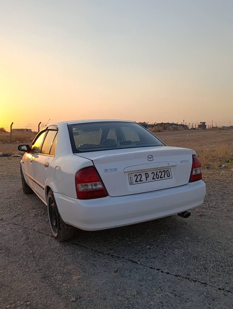 مازدە 2004گیرومەکینە بەشەرت وەرگراو براوە بەشەرت  سولف و تەبریدە تەبرید لە سلۆری ایش دەکا  سیارەکە پشی کەپسە پشتی جەمکی خەفیفی هەیە سیارەکە بس ماشاللەی دەوی *********** أربيل, العراق
