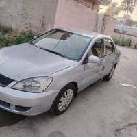 لانسر ٢٠١٠ • محرك ١٦٠٠ • رقم ديالى