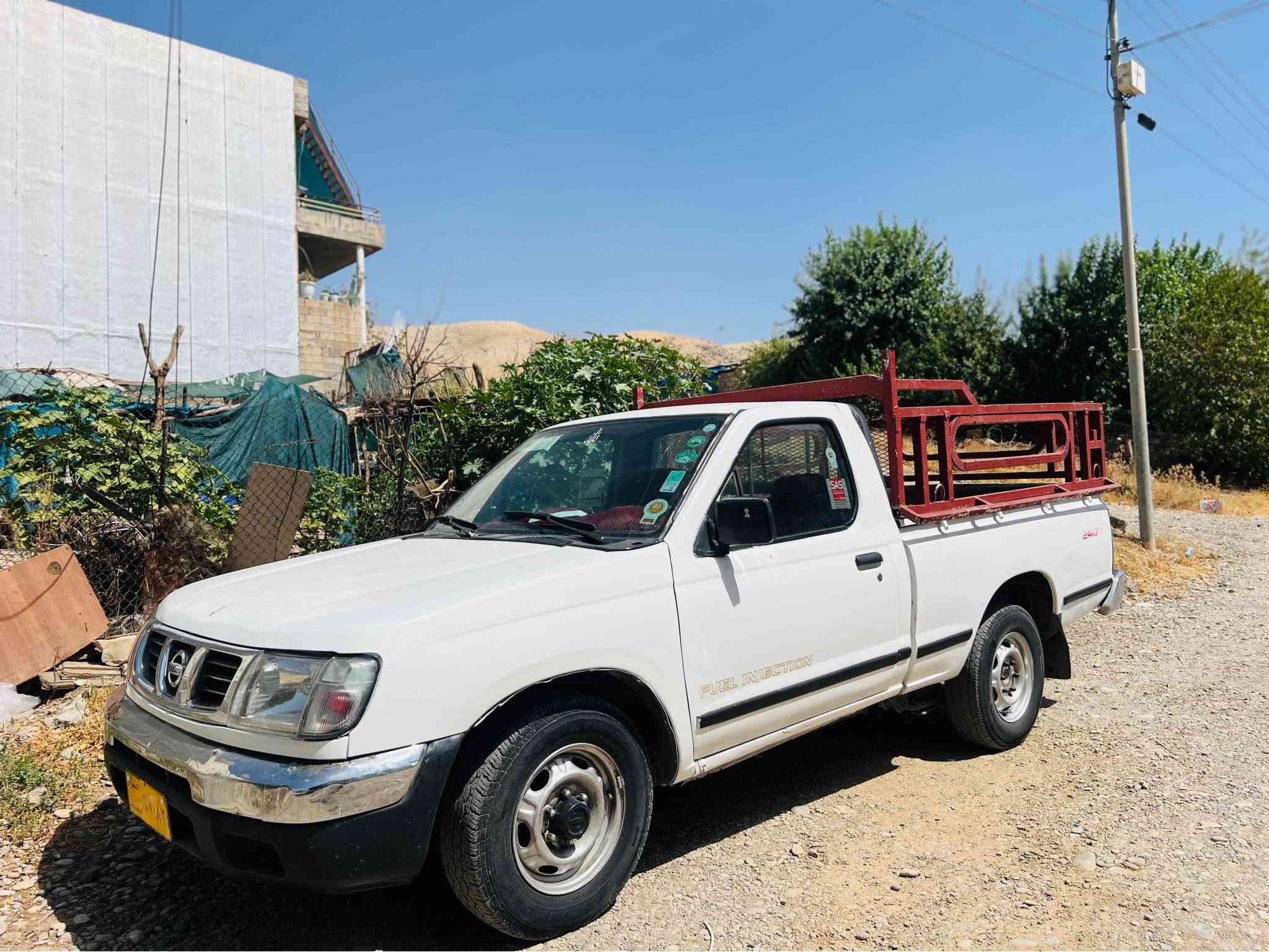 نیسان پیکاب ٢٠٠٠ تاک ٤قولاب ناوسور چەمچەکەی لەگەڵە کبرێتەی لۆک گێڕو مەکینەی لۆک پێشی تازە داگیراوە کلاج و عەینەی لۆکە  هەمەو گیانی بەشەرت یەک دینار مەسرەفی نی سەیارەکە علوجە ماڵی مەدەنی بەشەرت تەبرید و پاوەر نیە سعری ٤١ گەڵاو مەجالێکی زۆر کەم ***********
