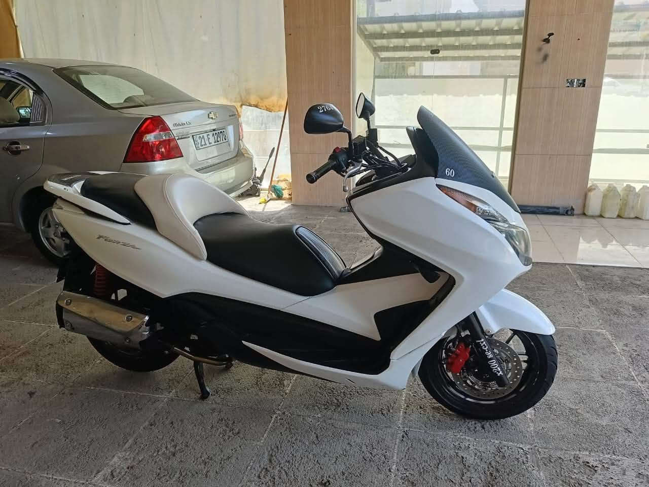 HONDA FORZA 012
بۆ فرۆشتن هەموگیانی بە شەرتو بە زەمان 
شکای نیە ماتۆڕەکە تەنها ۷٠ هەزار ڕۆیشتە
کامل سێرفز کراوە مەسرەفی تیا نی بە زەمانی هەمو شتێک ئەی فرۆشین 
ڕدێتەر خەمی گەرم بونیو نیە مەکینەی ۲٥٠cc
ماڵی دۆست ماتۆڕکە خۆی دیارە پێویستی بە وەسف نیە
شۆن سلێمانی بۆ نرخیش خوار هەمو بازاڕە
بۆ زانیاری زیاتر تێل بکەن بە ***********
