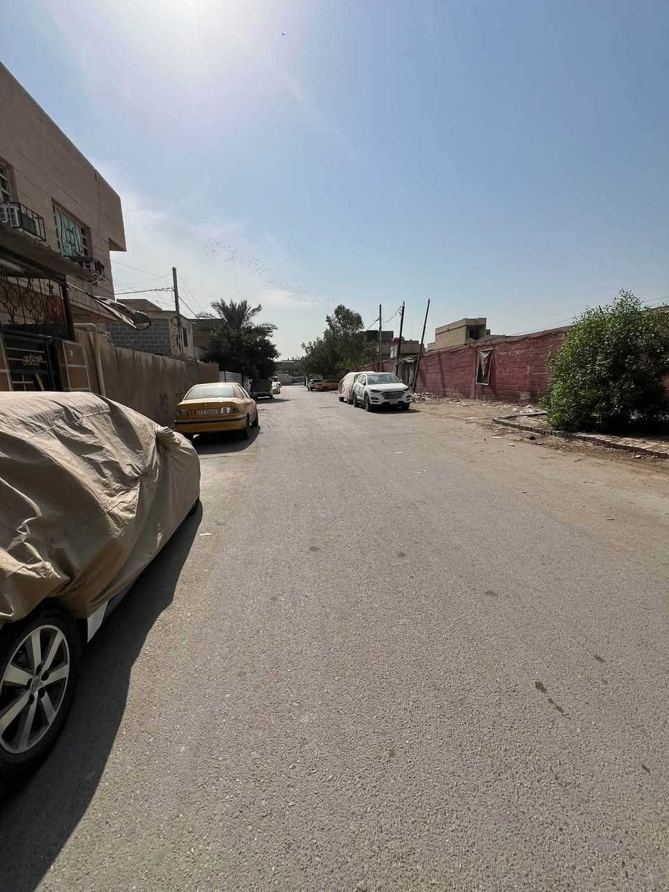 نصف قطعة • مدينة الصدر • شارع ستين