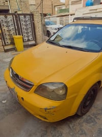 عدي سياره اوبتره 2005 كير اومكينه خير من الله  رقم بغداد مكان السياره ...