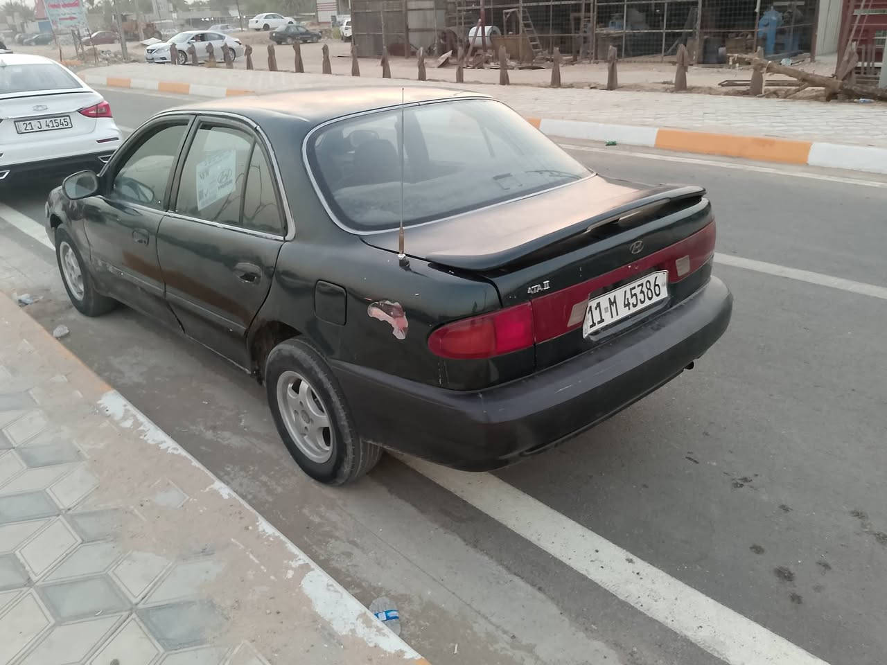 سوناتا 2
كير اوتو نضيف
مكينة بيها خيط ضعيف
رقم بغداد دولي الجديد سنوية لل 29
كشر شوفة عينكم يرادلها حزام 
تخم تاير نضيف 
داخل بلادي ارضية جلد
منضومة بانزين جديدة 
السيارة مال تمشية حال خير من الله جاهزة 
سعرها 28 وبيها مجال سعر النترا 
مكاني ديالى الخالص 
***********
