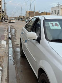 اوبتره 2014 كفاله عامه من كلشي عدا بارد صغير ما مبين بل باب خلف السايق...
