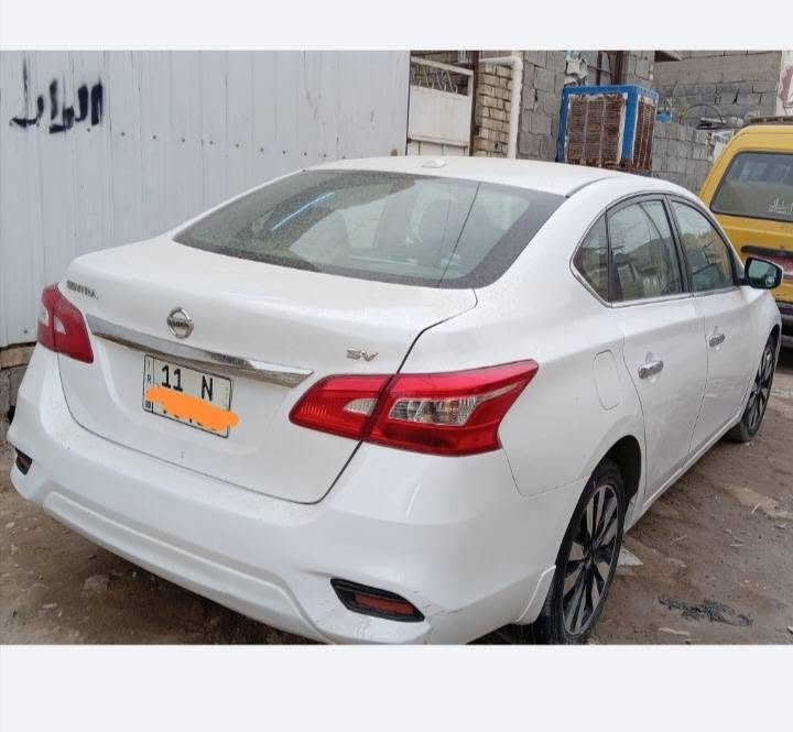 السلام عليكم ورحمة الله وبركاته من رخصة الادمن نيسان سينترا 2019 وارد أمريكي اللون ابيض رقم بغداد سنوية بسمي جديدة تنتهي 2029.. حادثه جاملغ خلفي الأيمن جدا بسيط وخدوش بالجنطة بسيطة مصلح ومصبوغ.. وبارد الباب الخلفي الأيمن.. گير ومحرك وتبريد مكفولة كهربائيات خير من الله السعر 115بي مجال.. رقم الهاتف ***********.. المكان بغداد.

نص مكتوب في الصور:
- 000-27514913 - 04/07/2020 - IAA BidFax.info