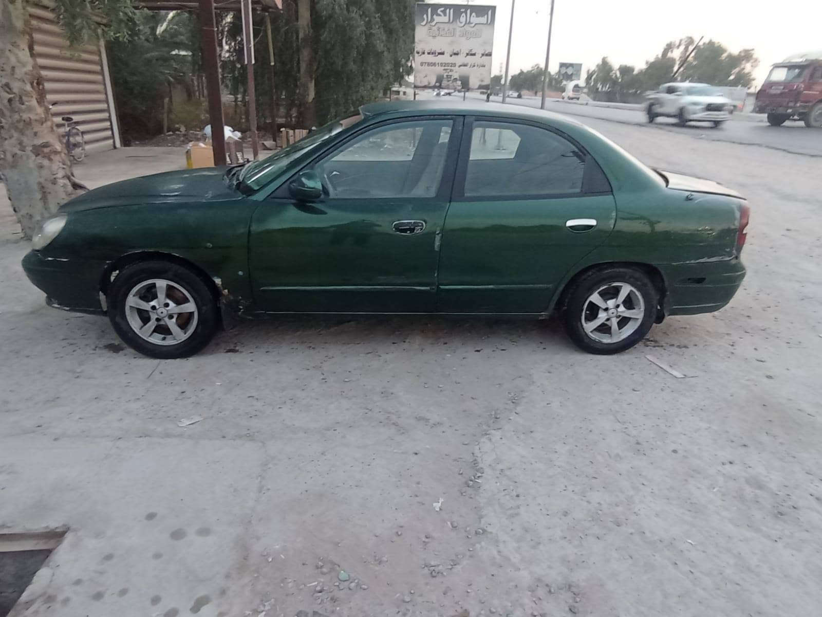 السلام عليكم دايو نوبرا ٢٠٠٠ رقم بغداد انكليزي محرك مسكر كير عادي تبريد شغال  كهربائيات كامله مكفوله من الضربه القويه غرفتها حلوه تخم ويل كب جاهزه السياره نقص فقط مشط ستيرن سنوية لل٢٧  *********** مامتواجد عالنت اتصل وتدلل
