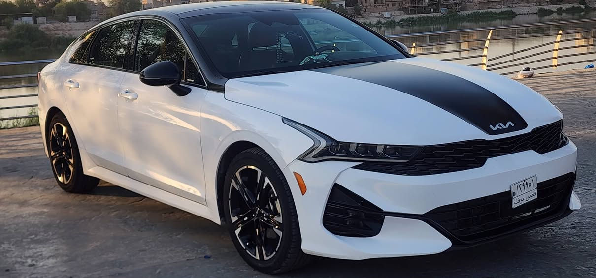🚘 كيا K5     GT-Line 2023
السياره منفيس دخول جديد
اللون:  ابيض
الفئة: GT-Line فول مواصفات
المحرك: 1600 CC تيربو
الحادث: خلفي خفيف تبديل دعامية خلفيه 
الكشنات: احمر 

المواصفات:
بانوراما
بصمة تشغيل وتشغيل عن بعد
شحن هاتف لاسلكي
قيادة ذاتية على الخطوط السريعة
هاند بريك بصمة
مثبت سرعة
ABS ومانع انزلاق
حساس ضغط الإطارات
بك لايت LED
شاشة مع خرائط ملاحة
كاميره دوارة
رادارات جانبية ومراقبة النقطة العمياء
رادار الخطوط البيضاء
إشارات بالمرايا
لايتات 3 عدسات
أوضاع قيادة Eco / Sport / Smart / Normal
بلوتوث + USB + AUX
تحكم ستيرن كامل
كير أوتو + عادي
أوتو بريك
ستيرن LED D
زينون
توقف ذاتي عند الرجوع
صندوق بصمة

📍 المكان: بغداد الكاظمية
  ***********
***********
