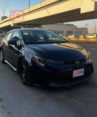كورلا 2021 للبيع  رقم بغداد سنويه جديده لل 2030  ماشيه 100 الف ميل وار...