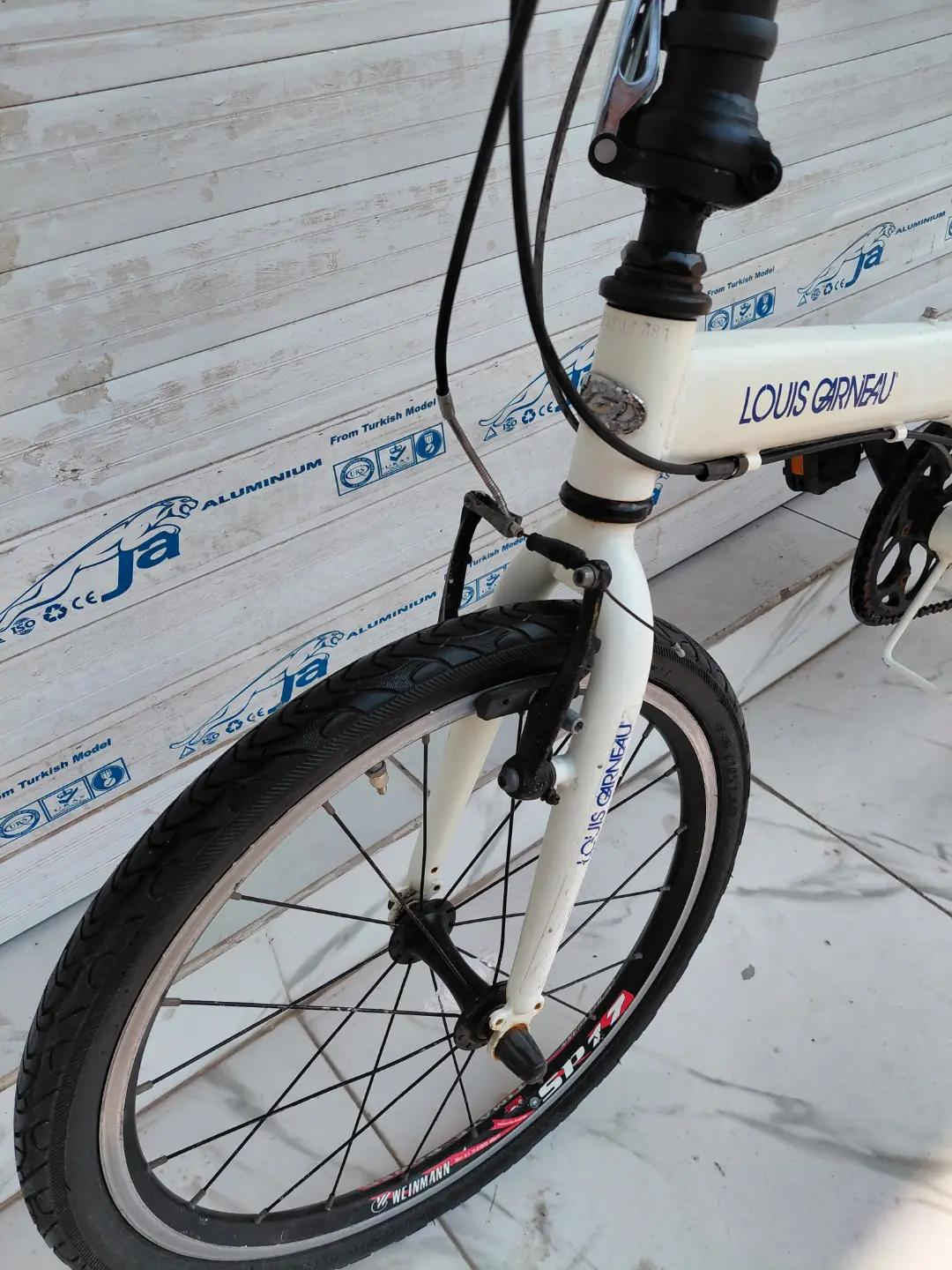 LOUIS GARNEAU FOLDING BIKE حجم 20 المنيوم بالكامل    ✈يوجد توصيل لجميع المحافضات ✈ كركوك مدخل سايدين حي الاسرى والمفقودين  معرض ابو شيفان ( *********** )
