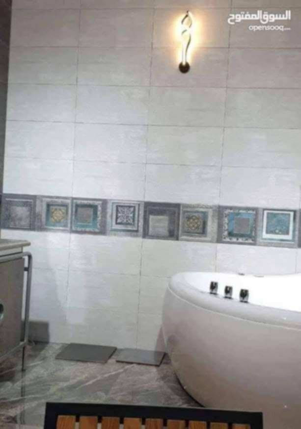 ..

لمبلغ دفعات مع
 مراحل انجاز  العمل..
باشراف كادر هندسي متخصص ذو خبرة في مجال التصميم والتنفيذ.
بغداد الكرخ قرب ساحه اللقاء 

 /للاتصال

  ***********  ( ابو جعفر ) 
متوفر واتساب
                   

مواصفات البناء:

١- تنظيف الارض بالكامل وقشط التربه حسب المنسوب .
٢- فرش طبقه من السبيس مع الحدل الجيد بحادله 13 طن ورش مبيد حشري (كلوردين )
٣- تاسيس مجاري PVC 10 بار مسلح والتنفيذ بطرق هندسيه
٤- تسليح الرفت بشيش f f حصيرتين ابعاد 25x25 وجسور على جميع الاضلاع
٥- صب رفت بسمك 40 سم باستخدام سمنت مقاوم للاملاح مع حصو مكسر ورمل فحص درجه اولى 
٦- صب بتلو وتسقيط الخريطه 
٧- بناء الطابق الأرضي بالطابوق الجمهوري درجه اولى خالي من الاملاح بنسبة 75% ارتفاع البناء 3.2 م 
٨- صب الجسور بارتفاع 30 سم 
٩- تسليح السقف بالشيش ff 
١٠- مد شبكات الكهرباء والجكشنات  وتاسيس شبكه للستلايت دفن
١١- صب السقف بارتفاع 20 سم 
١٢- عمل الطابق الاول بنفس المواصفات الطابق الارضي 
١٣- تاسيس الماء بثلاث خطوط بوري PVC مسلح
١٤- تاسيس انابيب السبالت وانابيب التقطير 
١٥- تنظيف موقع العمل بالكامل وعمل شتايكر السقف مع فلين مضغوط درجه اولى 
١٦- القيام باعمال اللبخ للستائر والمناور مع النثر 
١٧- القيام باعمال البياض للجدران الداخلية درجه اولى

١٨- تغليف جدران الحمامات والمطبخ بالسيراميك وحسب اختيار صاحب الدار 
١٩- محجر للسلالم حديد درجه اولى 
٢٠- تغليف الارضيه كاشي عراقي او بورسلين ايراني 
٢١- عمل ازاره سيراميك ايراني وحسب اختيار صاحب الدار
٢٢- ابواب داخليه خشب عراقي
٢٣_ شبابيك حديد والنقشه حسب اختيار صاحب الدار 
٢٤- باب خارجي تفصال 
٢٥- باب الحمامات PVC
٢٦- الواجهه نثر وتطعيم حجر (قرض) مع عمل كوبلنات للابواب والشبابيك .

نص مكتوب في الصور:
- السوق المفتوح
- opensooq