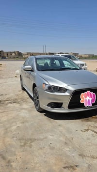 لانسر خليجي  رقم بغداد مصبوغه عام يعني مو كفاله سعر ٦٧ وبيه مجال  ٠٧٧٠...