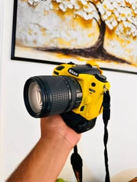 نيكون D7000 • عدسة 70-300 • كريب بطارية