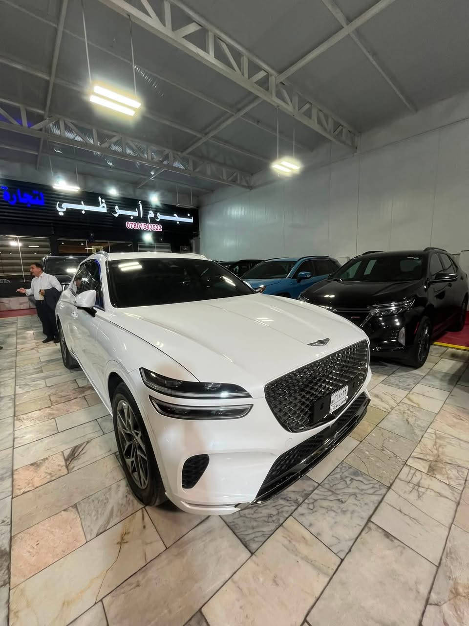 🚗 للبيع: جنيسيس GV70 م 2023
📍 مكان السيارة: النجف الأشرف
📞 للتواصل: ***********
💰 السعر:293 ورقة – قابل للتفاوض
📊 المسافة المقطوعة: 35 ألف ميل
🛠️ المحرك: 4 سلندر – 2500cc توربو

⚠️ حالة السيارة
• وارد أمريكي (دخول جديد)
• الأضرار: حادثها ربع الدعامية فقط، وتم استبدالها بقطعة أصلية بنفس اللون (بدون صبغ)
• صور الحادث مرفقة 

⚙️ المواصفات (فول مواصفات):
• فتحة سقف بانوراما
• بصمة تشغيل
• تشغيل عن بعد
• مقاعد جلد (تدفئة + تبريد + مساج) مع ذاكرة خزن لوضعيات المقاعد
• رادارات كاملة (أمامية + خلفية + جانبية)
• شاشة وسطية كبيرة
• كاميرا خلفية
• وبقية المواصفات المعروفة

📌 تفاصيل إضافية
• دخول جديد بدون رقم (تترقم جميع المحافظات عدا الإقليم)
• المنفيس باسم المالك
• لون السيارة: أبيض
