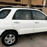 سبورتج ٢٠٠٩ خليجي داخل عسلي بدون صبغ محرك ٢٠٠٠ المواصفات المعروفه مال ...