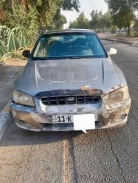 اكسنت ٢٠٠٢ • رقم بغداد • باسمي