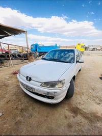 بيجو 306 موديل 2001 رقم بغداد دولي محرك z6 كير رياضي  تبريد ثلج  ضفيرة...