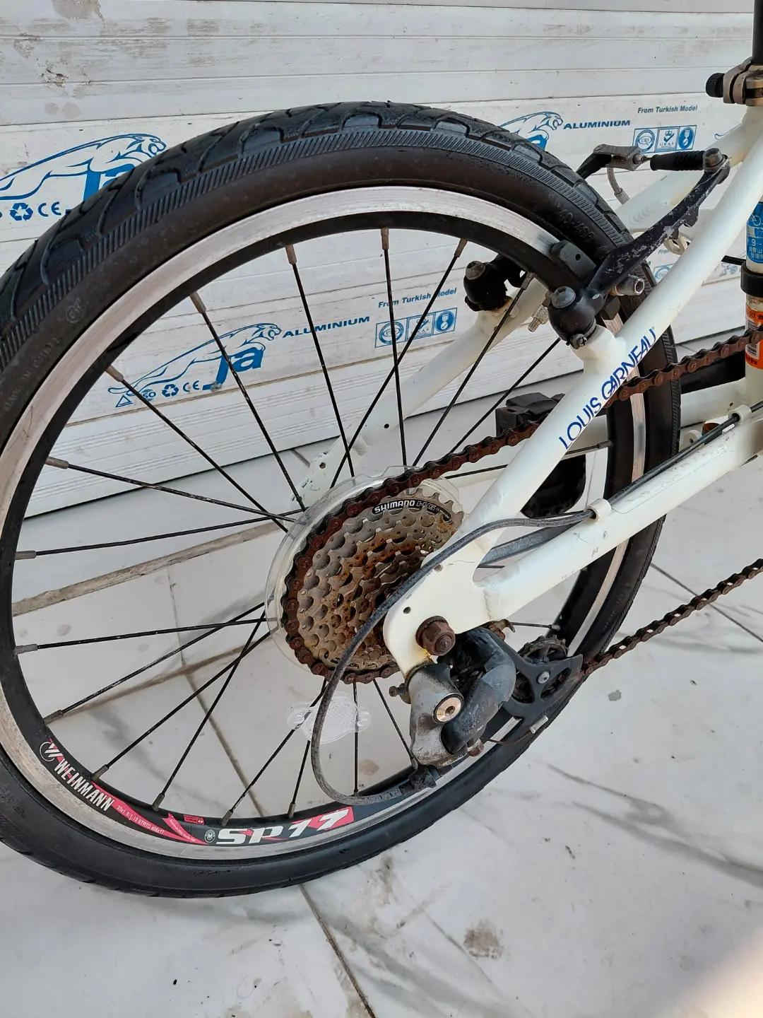 LOUIS GARNEAU FOLDING BIKE حجم 20 المنيوم بالكامل    ✈يوجد توصيل لجميع المحافضات ✈ كركوك مدخل سايدين حي الاسرى والمفقودين  معرض ابو شيفان ( *********** )

